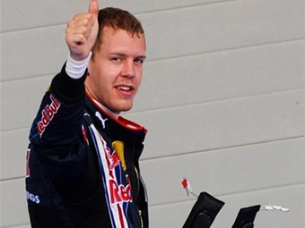 Себастьян Феттель (Red Bull) во время Гран-при Бахрейна, 2009. Фото (c) <a href="http://lenta.ru/info/afp.htm">AFP</a>