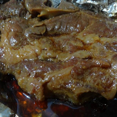 Рецепт Нежные свиные стейки, запеченные в духовке